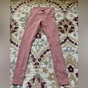 Victoria's Secret leggings. Pinkish/orange. Size small